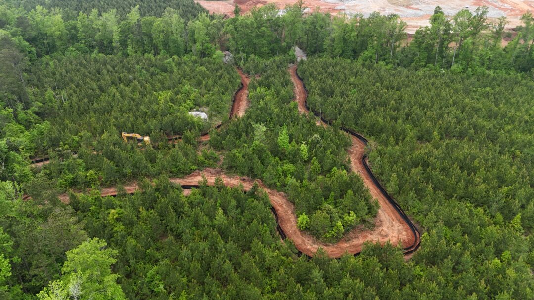 Aerial View of Forestry Clearing with Silt Fencing Aerial view of forestry clearing paths with silt fencing for land development project